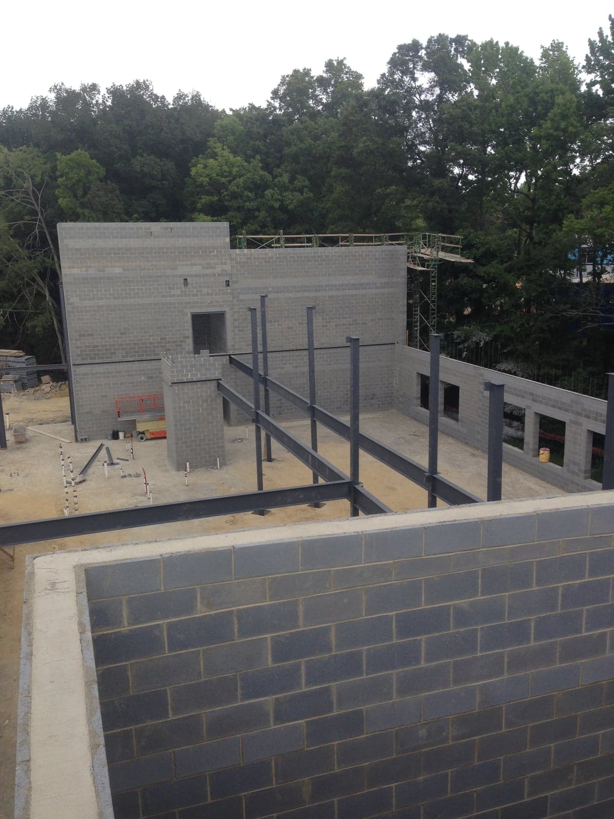 Large commercial brick paver project under steel canopy