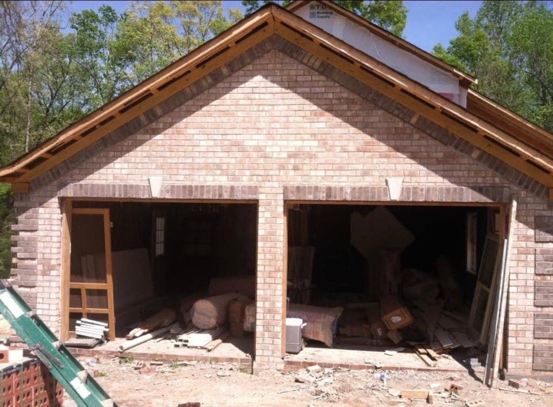 Brick gable end with trim detail under construction