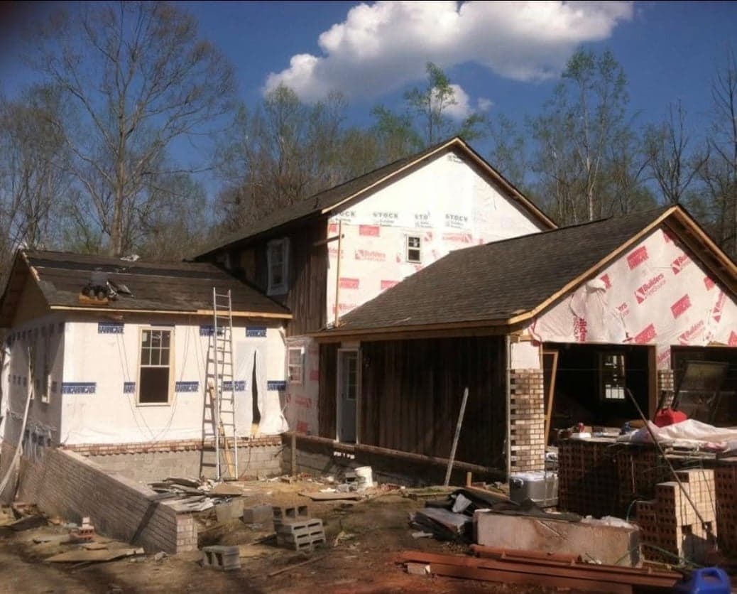 Multi-gable brick home under construction